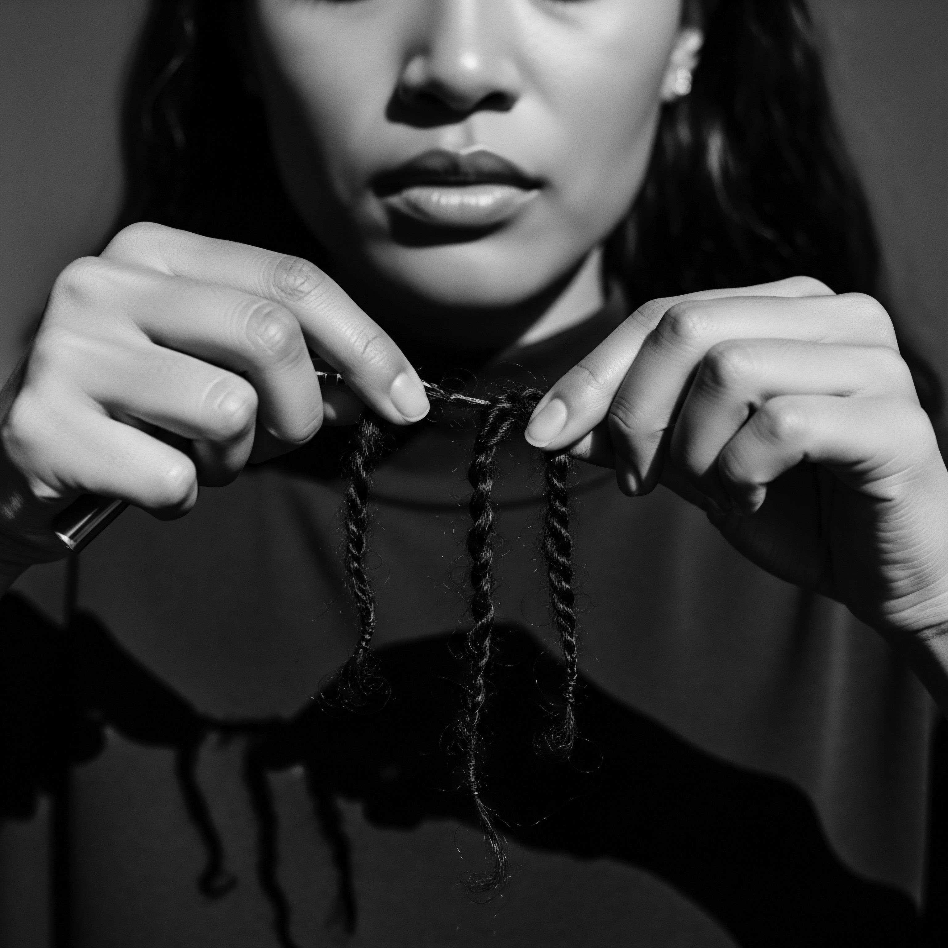 Hands Crafting Protective Styles for Textured Hair Coils and Heritage Hands gently work to form protective coils, reflecting deep rooted cultural traditions of textured hair care. This intimate moment connects to heritage, wellness, and the enduring legacy of styling Black hair, underscoring self expression within diverse communities.