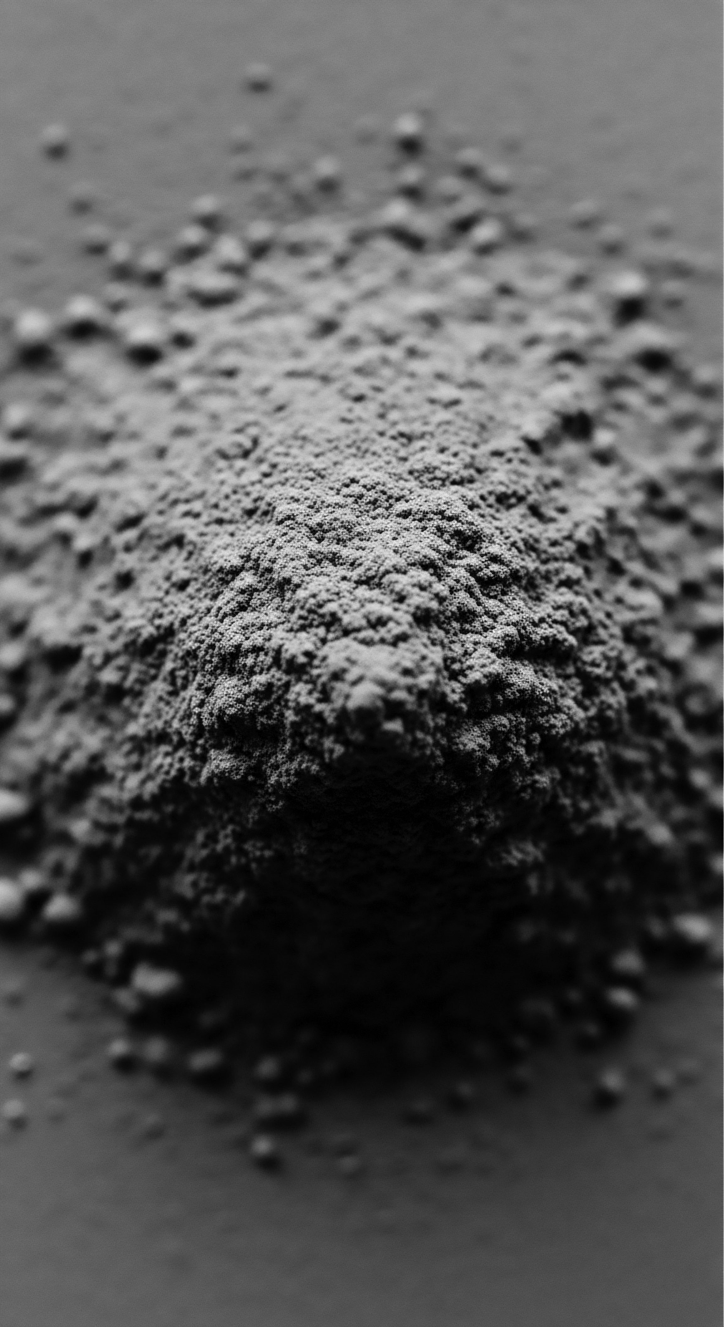 Monochrome Powder Abstract: Mineral Rich Earth Clay for Scalp Treatment The granular substance evokes ancient beauty traditions, whispering of regenerative scalp masks. Each minute speck carries the potential to rejuvenate roots and promote healthy growth. With a blend of earth-based minerals, this powder captures heritage and mindful hair care.