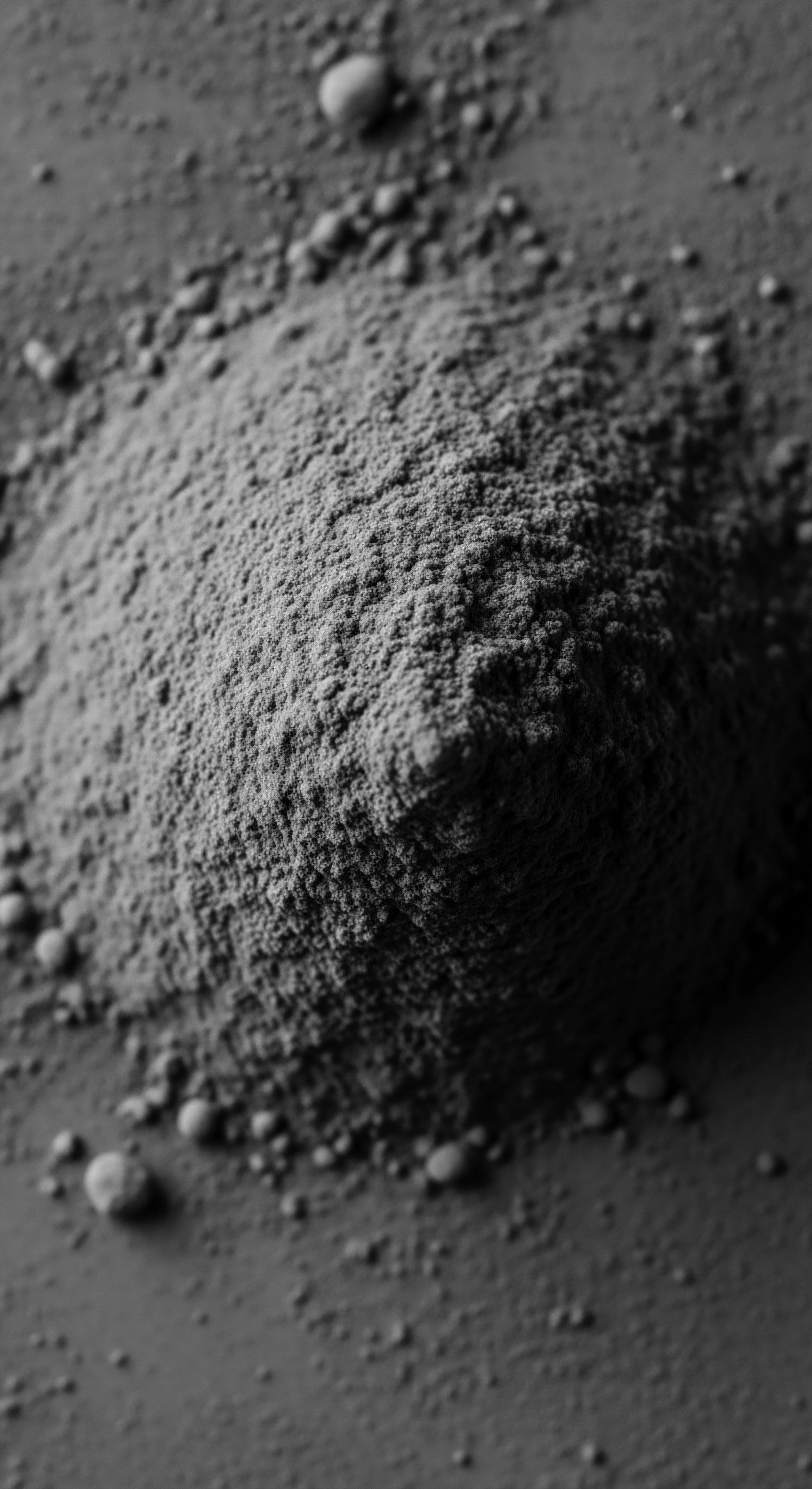 Monochrome Volcanic Ash Sedimentation Representing Dense Textured Hair Formations The monochrome gradient and ash-like texture symbolize resilience, echoing the strength of tightly coiled hair and diverse textured hair narratives. Each grain mirrors individual ancestral strands woven into a rich tapestry, a testament to the timeless heritage of natural texture and formations.